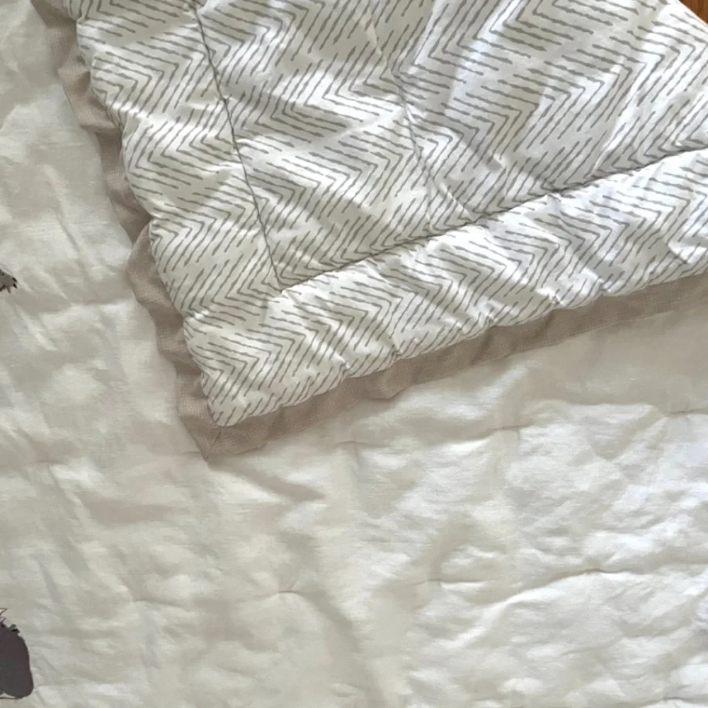 Lambs & Ivy Toddler linen blend safari quilt